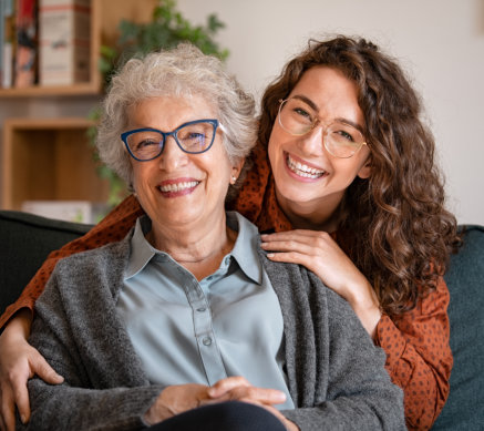 woman and senior smilling