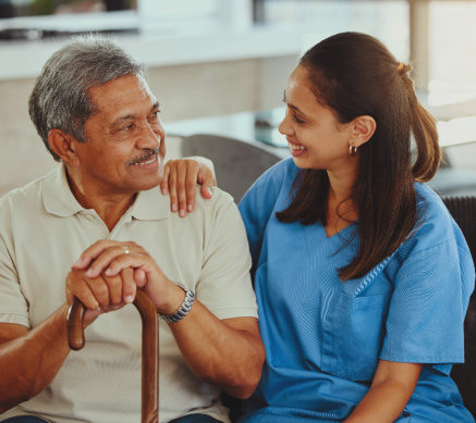 woman holding the shoulder of senior