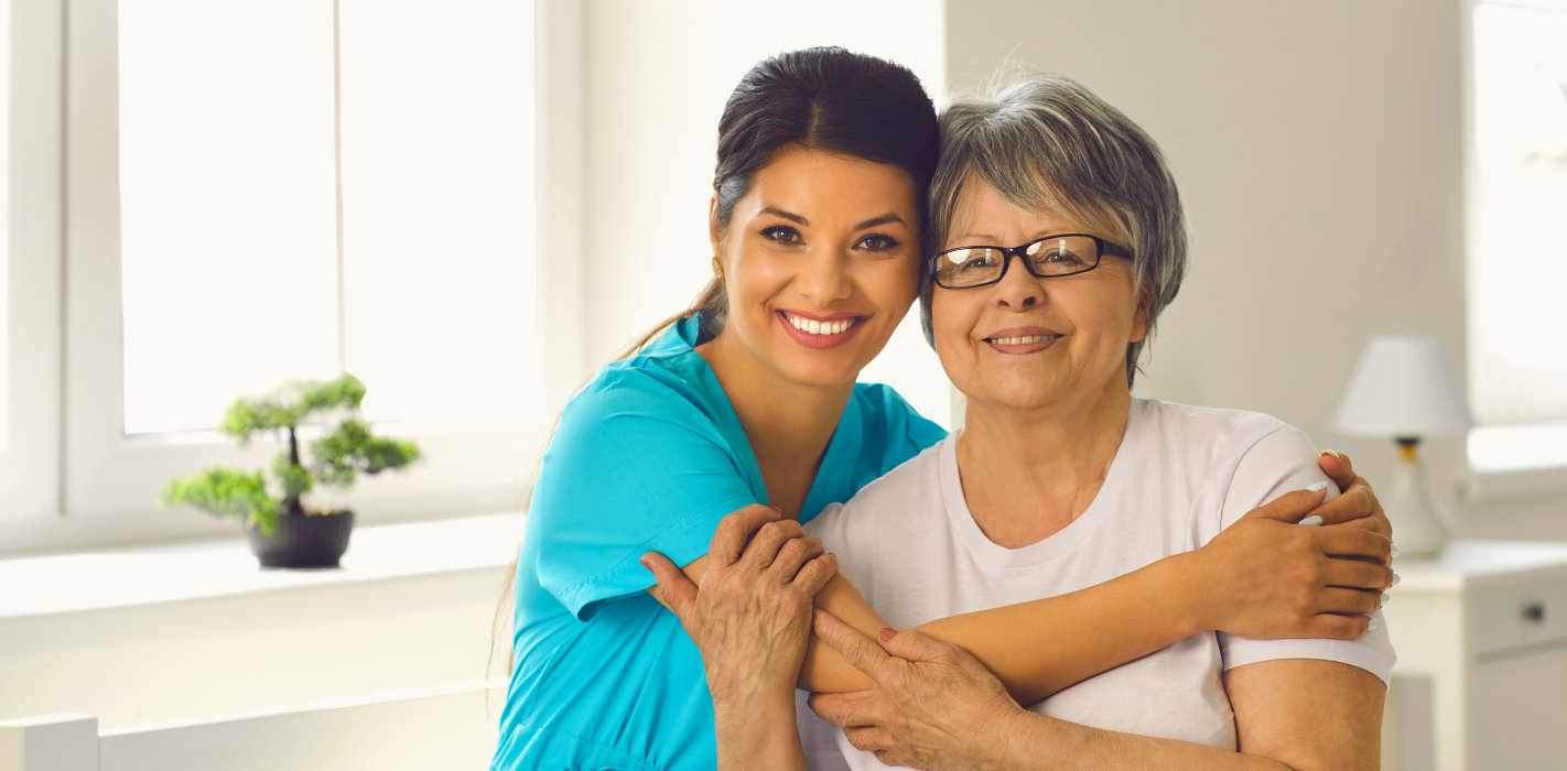 woman hugging the senior