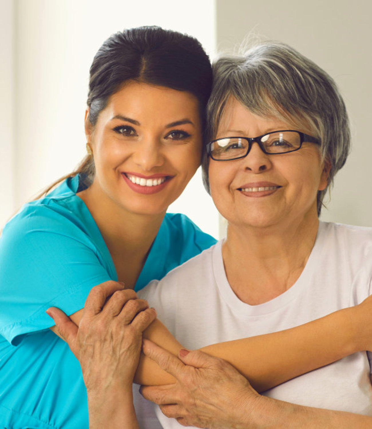 woman hugging the senior