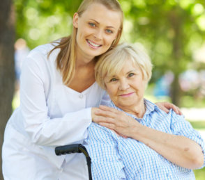 woman hugging senior