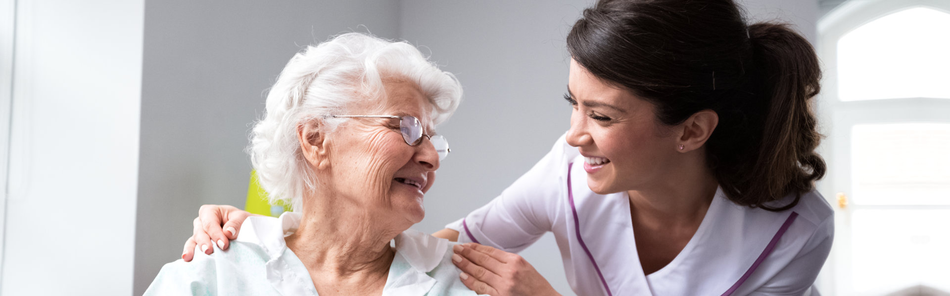 woman and senior smilling