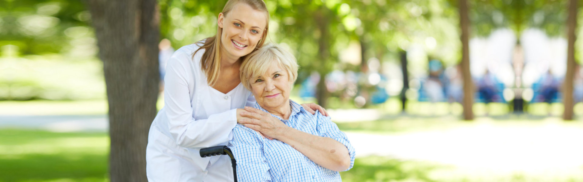 woman hugging senior