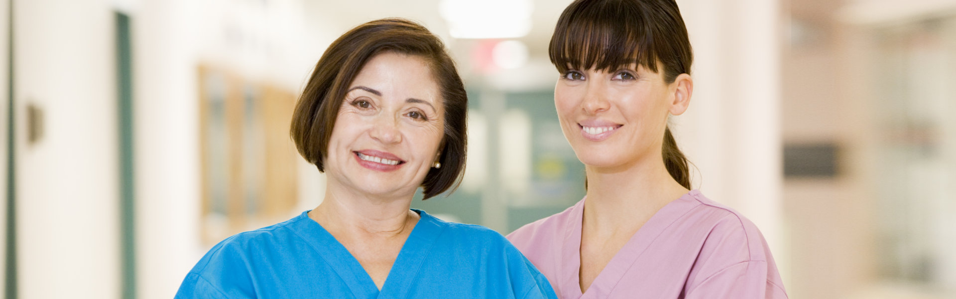 two woman smilling